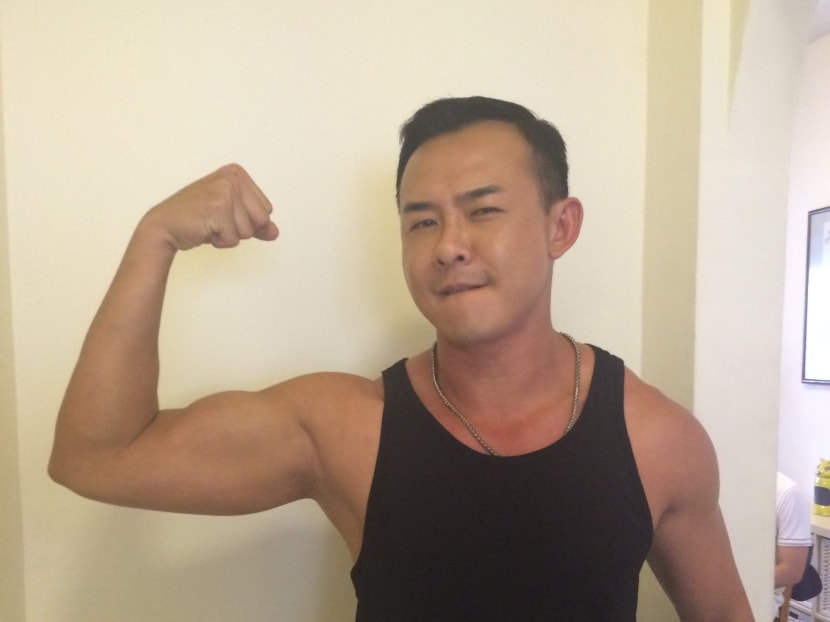 Bryan Wong flexes in the cheesiest manner he can think of. Photo: May Seah