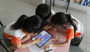AI use in Singapore schools kept age-appropriate, with focus on learning, not shortcuts: Desmond Lee 