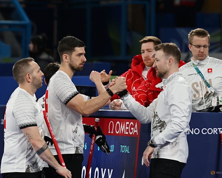 Curling-Switzerland's Schwaller following in father's footsteps at Winter Games