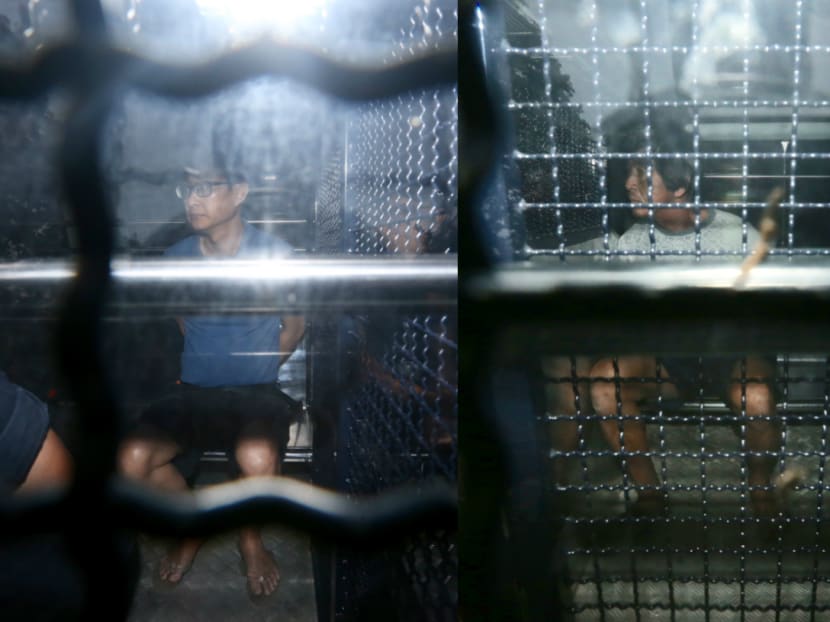 (From left) Chew Eng Han and Tan Poh Teck, both arrested for “Attempting to Leave Singapore Unlawfully at Unauthorised Point of Departure” under the Immigration Act, are seen arriving at State Courts on February 22, 2018. Photo: Koh Mui Fong/TODAY