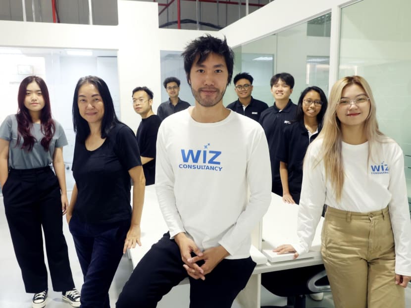 Mr Lee Jin Rui, 22, founder of Adolet, with his team at their office at Mega@Woodlands. Adolet is a digital skills education firm.