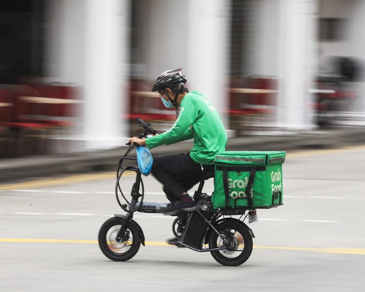 The Big Read in short: Are working conditions making it unsafe for food delivery riders on roads?  