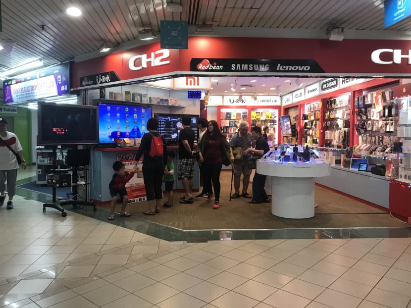 Sales of Android TV boxes continue to be brisk at Sim Lim Square, with retailers claiming that their products – which also come preloaded with apps that lets users stream copyrighted content – are different since they are not “specifically adapted” for making copies of copyrighted content. Photo: Wong Pei Ting/TODAY