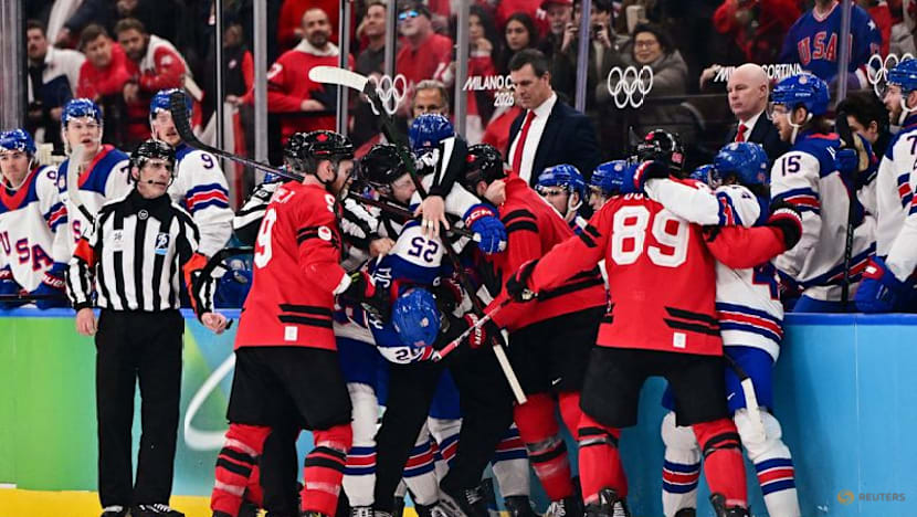 Ice hockey-US claim long-awaited gold by beating rivals Canada in overtime thriller