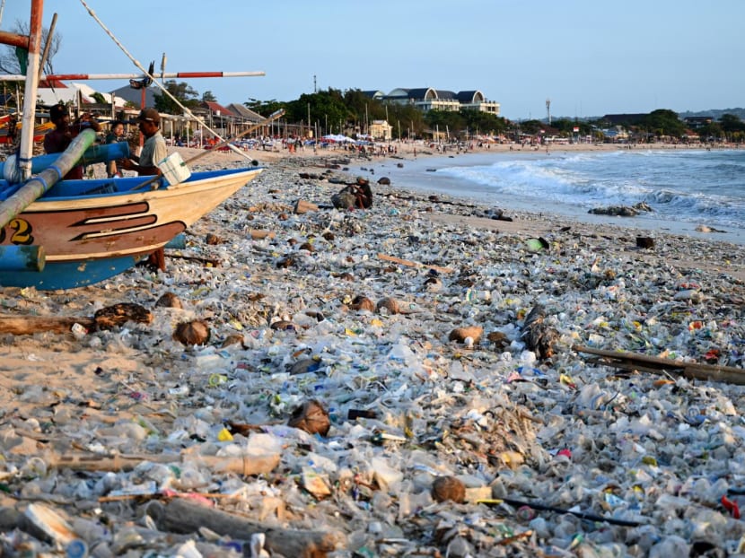 Plastic and other debris are washed ashore at Kedonganan Beach near Denpasar on Indonesia's resort island of Bali on March 19, 2024. Plastic and other debris are washed ashore at Kedonganan Beach near Denpasar on Indonesia's resort island of Bali on March 19, 2024.