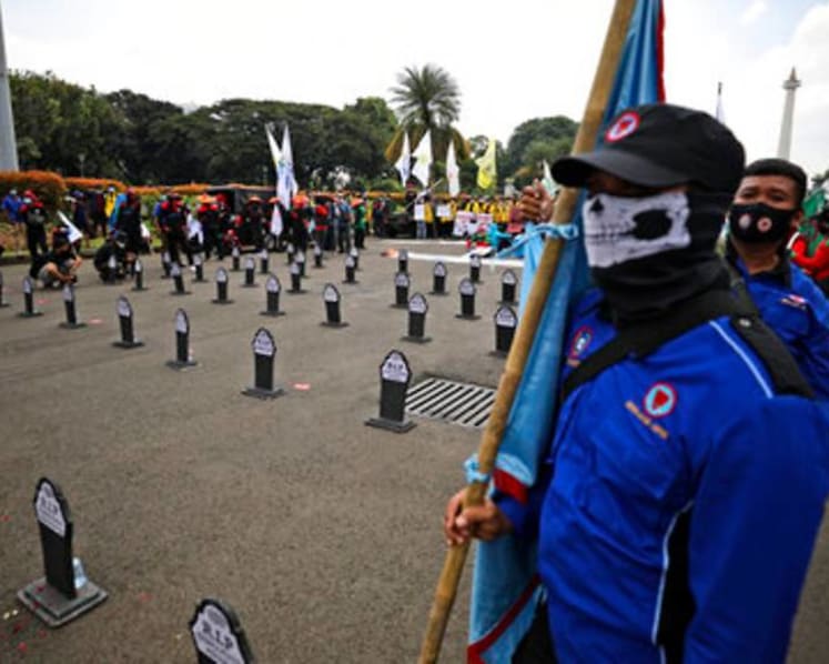 Workers protest Indonesia's labour law in May Day rallies