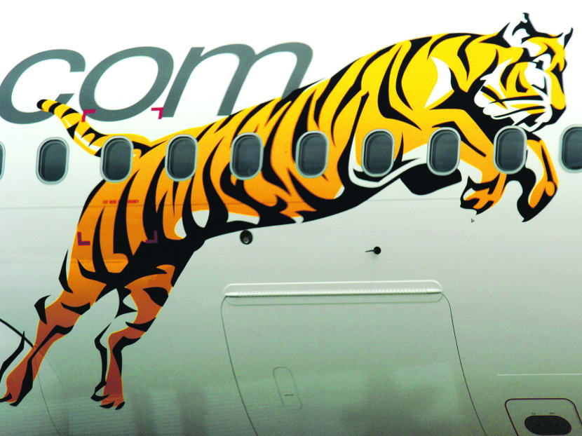 The carrier will continue to maintain an active presence through Tigerair Singapore. PHOTO: Bloomberg