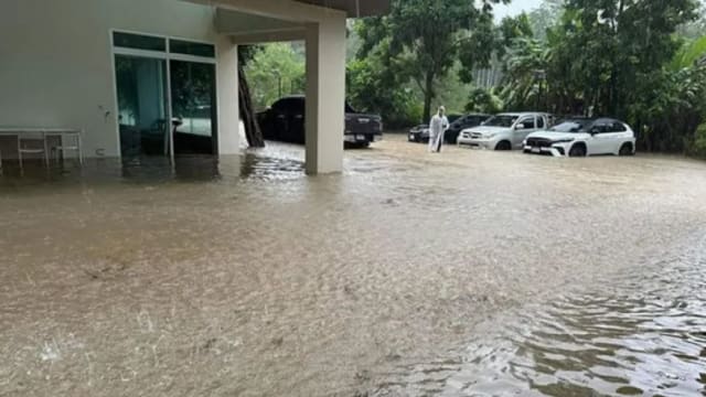 泰国普吉岛水灾淹公路 游客受促提早出发到机场