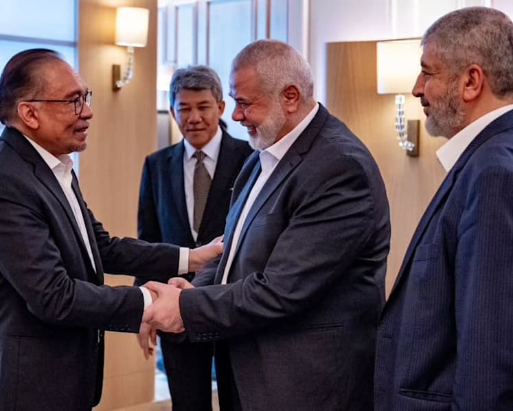 Malaysia PM Anwar meets Hamas leaders in Qatar, urges Israel to stop atrocities against Palestinians