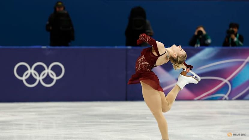 Figure skating-Liu shines while Glenn suffers heartbreak in Milan