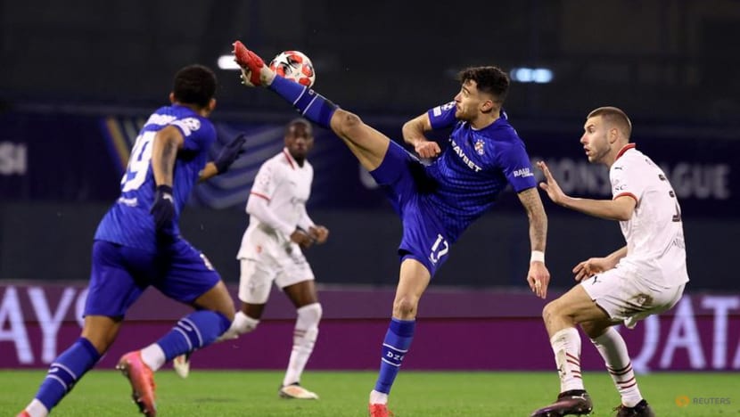 Ten-man Milan settle for playoff spot after Dinamo loss