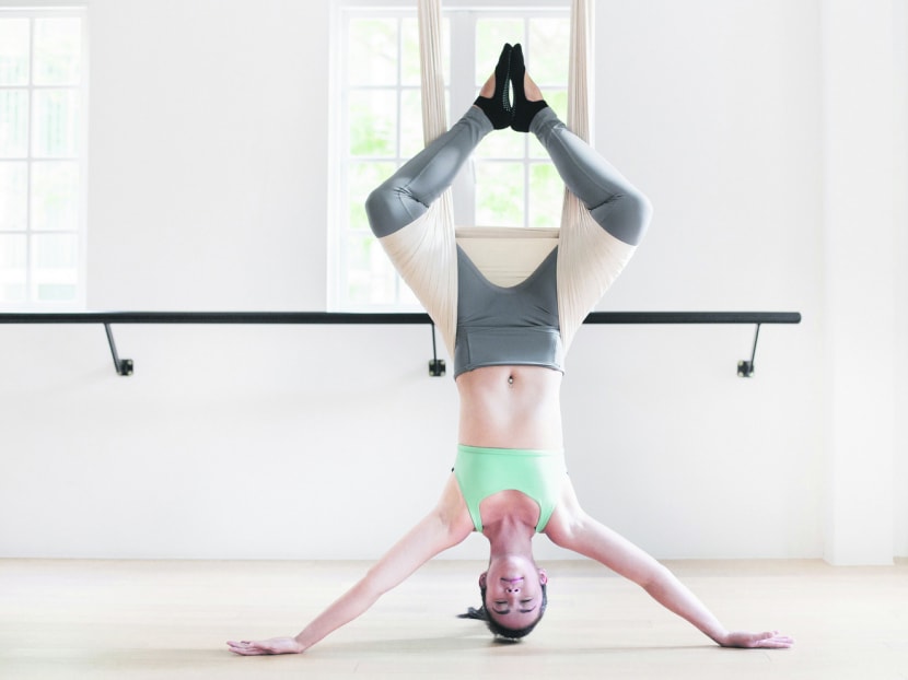 Fitness regimes are getting S'poreans to surf, bounce and wield a light saber