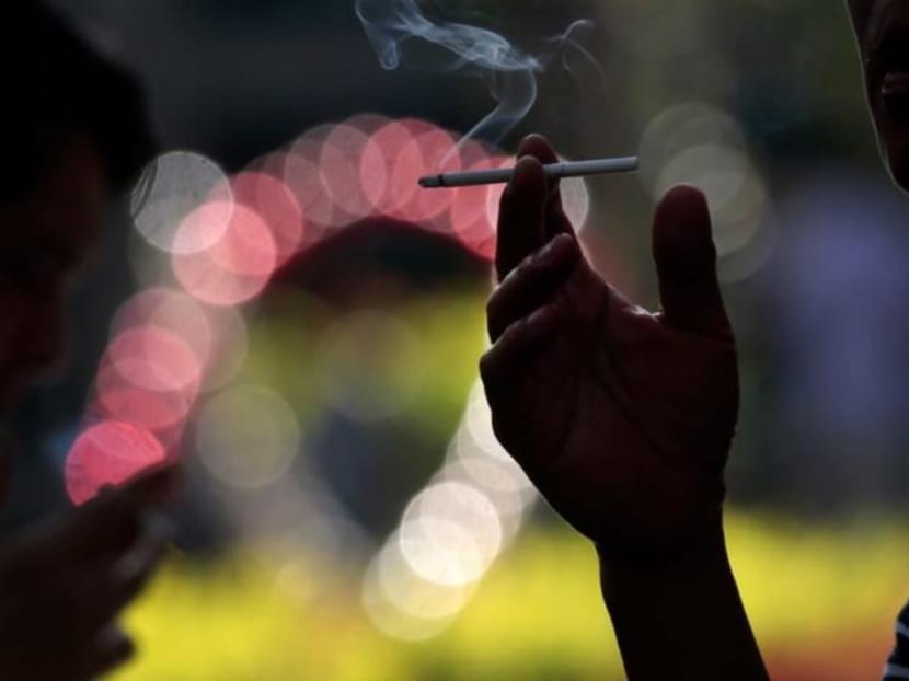Ban smokers from lighting up while walking to curb potential spread of Covid-19 Ban smokers from lighting up while walking to curb potential spread of Covid-19
