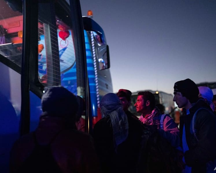 Desperation drives thousands of Afghans a day across borders