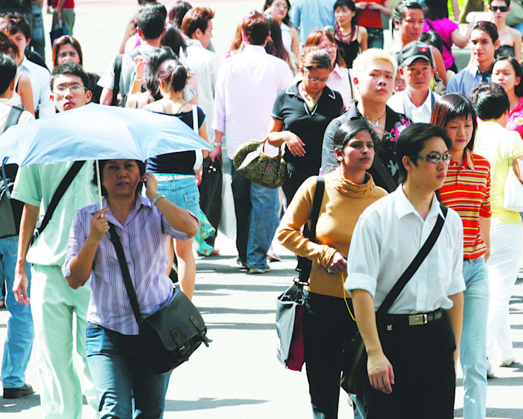 Lower-wage civil servants to get pay hike next month