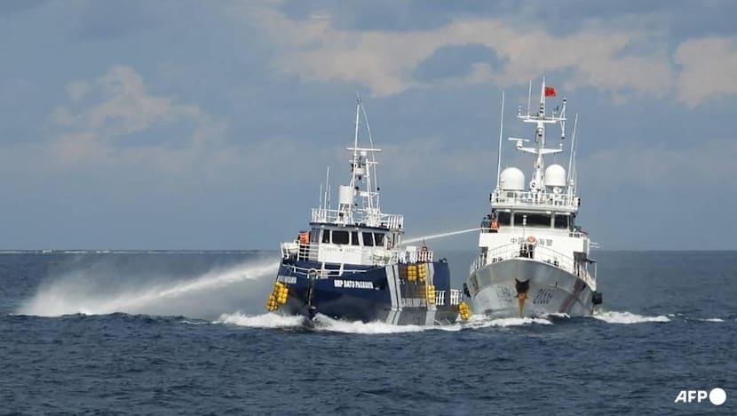 China, Philippines trade blame over boat collision in disputed sea