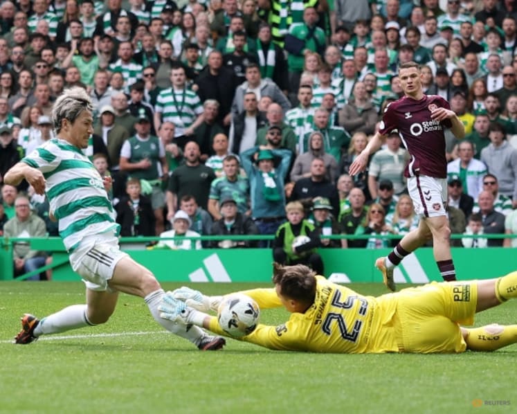 Celtic snatch title from Hearts with last-gasp victory on final day