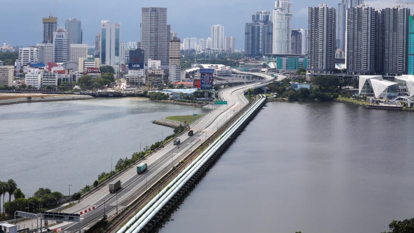 Singapore, Malaysia to work towards recognising Covid-19 vaccine certificates, 'progressively restore' cross-border travel