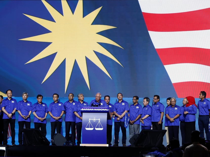 Malaysia's Prime Minister Najib Razak speaks during the launch of Barisan Nasional's manifesto for the upcoming general elections on April 7.  The authors say the delineation exercise has contributed to despair among various groups, particularly millenials, resulting in lukewarm enthusiasm for the democratic process.