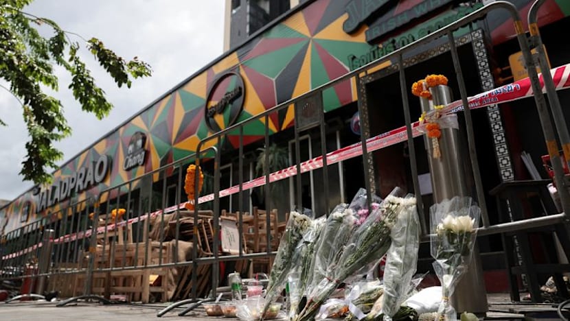 Woman dies week after Bangkok bar fire, raising toll to 34