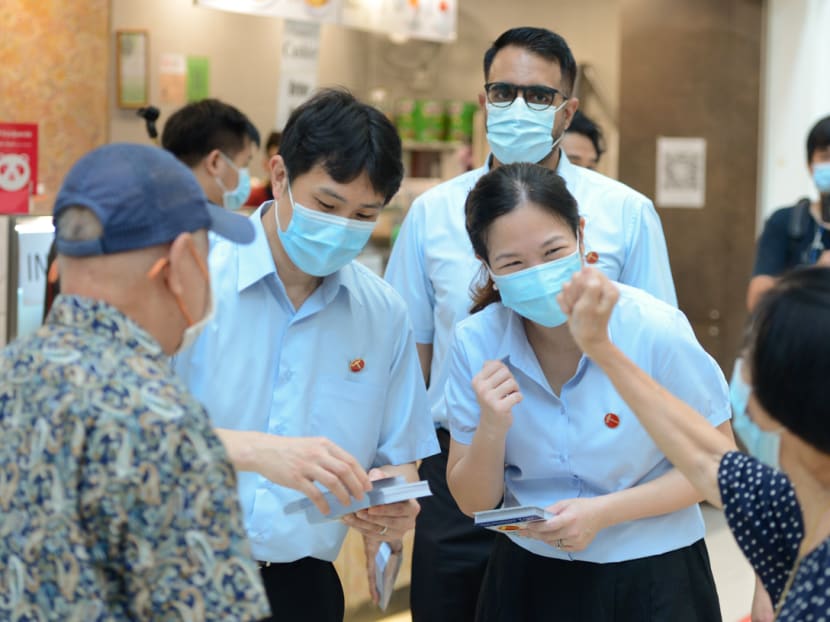 Workers' Party candidates for Sengkang GRC Jamus Lim and He Ting Ru, flanked by WP secretary-general Pritam Singh, greeting residents at Rivervale Plaza on July 7, 2020. Workers' Party candidates for Sengkang GRC Jamus Lim and He Ting Ru, flanked by WP secretary-general Pritam Singh, greeting residents at Rivervale Plaza on July 7, 2020.