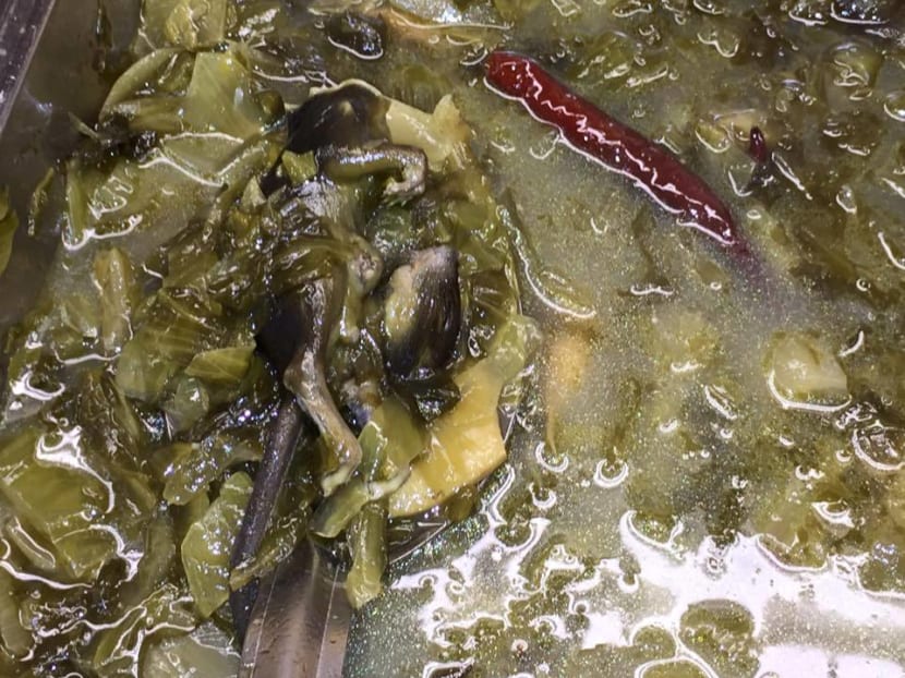 A rat carcass was found in a vegetable dish at a buffet at Hotpot Culture, a restaurant in Marina Square. Photo: Facebok/Caron Chan