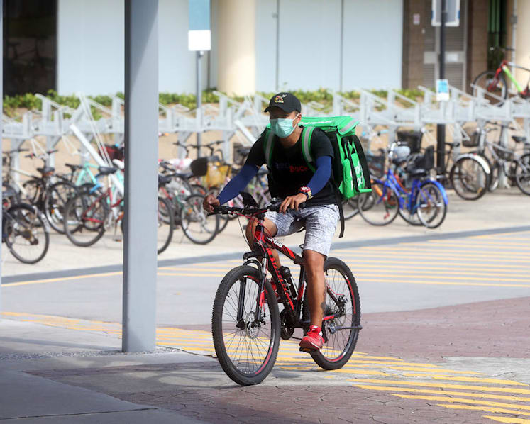 Food delivery riders caught in the middle, as F&B outlets and delivery platforms tussle over commissions