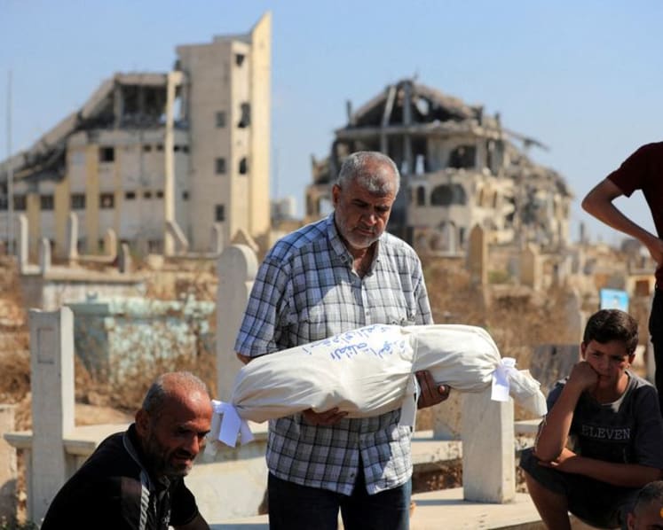 Gaza civil defence says Israeli strikes kill 12, including family of six