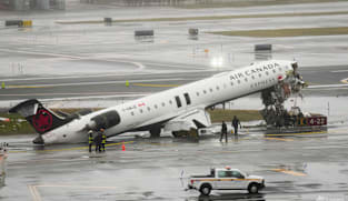 Two dead in New York jet collision, Trump deploys ICE to strained US airports