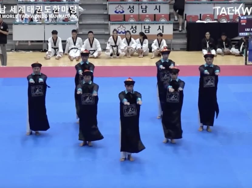 A taekwondo team from Shenzhen in China was punished for performing a zombie-inspired routine at an international event in South Korea. A taekwondo team from Shenzhen in China was punished for performing a zombie-inspired routine at an international event in South Korea.