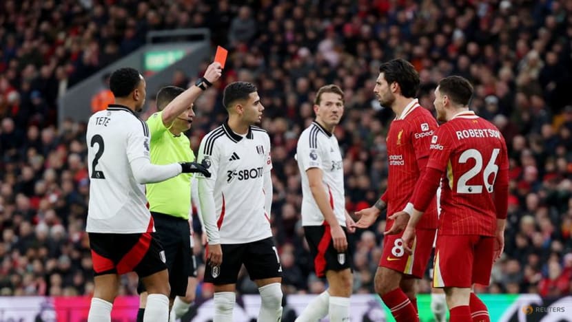 Late Jota goal for 10-man Liverpool salvages draw against Fulham