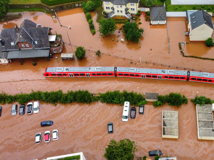 An aerial photo taken on July 15, 2021 shows a train station of the town of Kordel, flooded by the water of the river Kyll, western Germany, following heavy rains. An aerial photo taken on July 15, 2021 shows a train station of the town of Kordel, flooded by the water of the river Kyll, western Germany, following heavy rains.