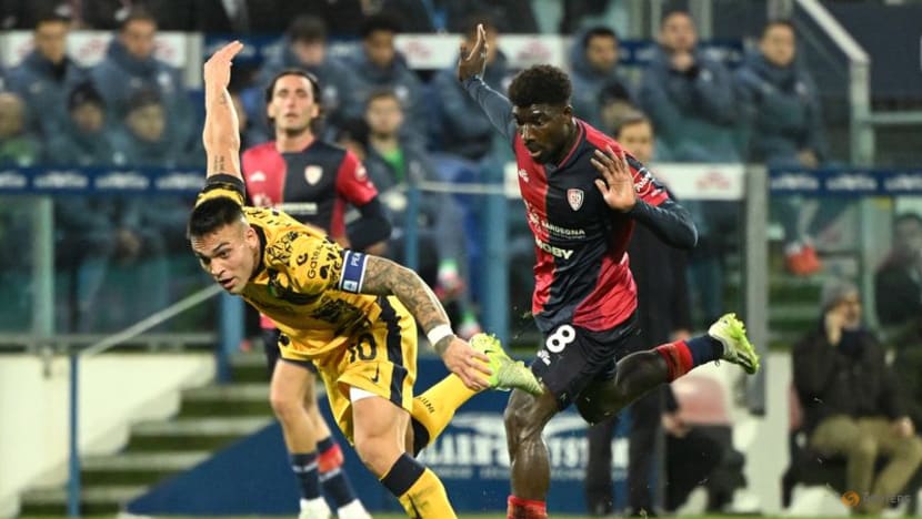 Inter dispatch Cagliari 3-0 to keep pace at Serie A summit