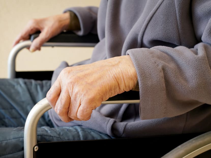 Aye Aye Than was hired to feed a man who had suffered from strokes, change his diapers and help him move from bed to wheelchair. Aye Aye Than was hired to feed a man who had suffered from strokes, change his diapers and help him move from bed to wheelchair.