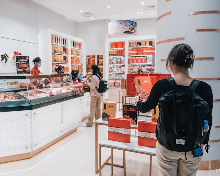 Participating shops in Changi Airport's public areas will absorb 8% GST in 2023