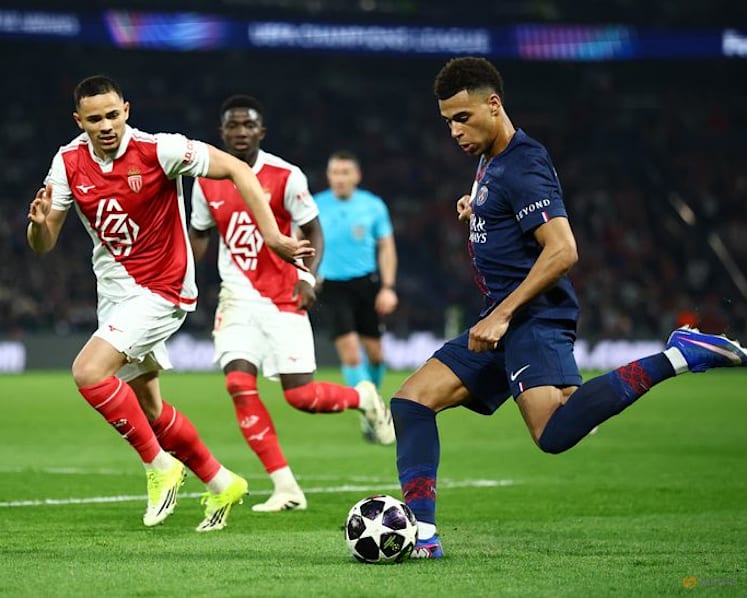 PSG see off late Monaco surge to advance in Champions League