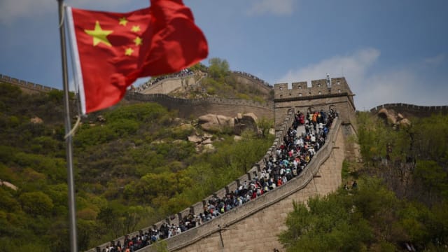 中国拟立法禁穿“伤害民族情感”服饰