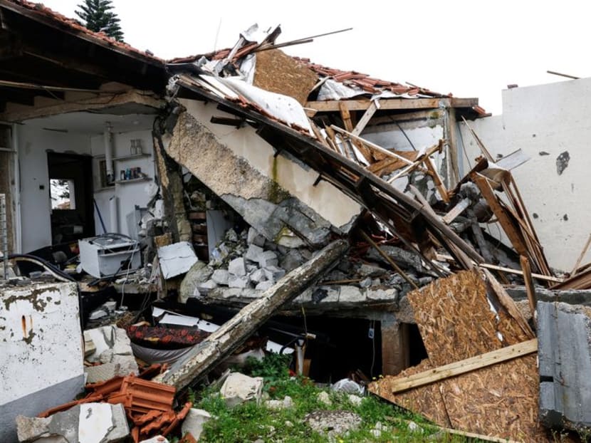 The exterior of a house damaged, according to Israeli authorities, by a rocket fired by Hezbollah in Lebanon, amid ongoing cross-border hostilities between Hezbollah and Israeli forces, is seen near Israel's border with Lebanon in northern Israel on March 19, 2024.