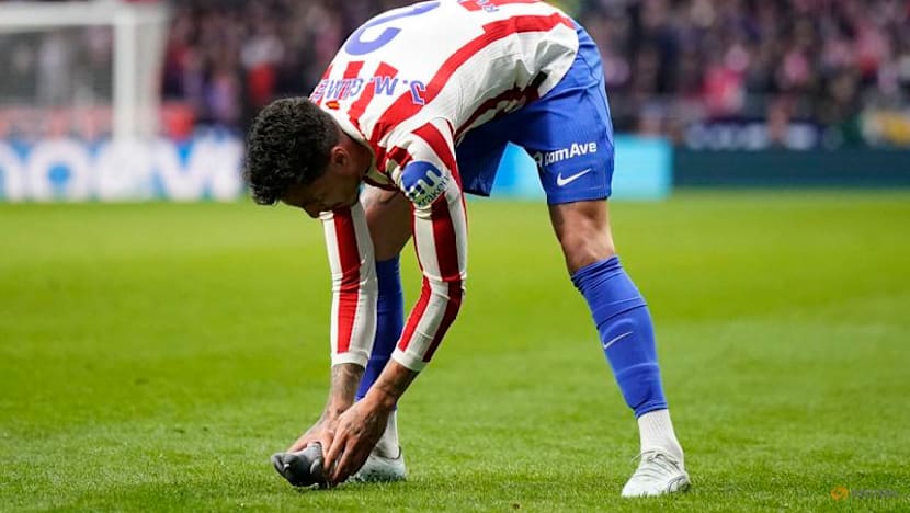 Gimenez swoops in after pigeon pauses Atletico match