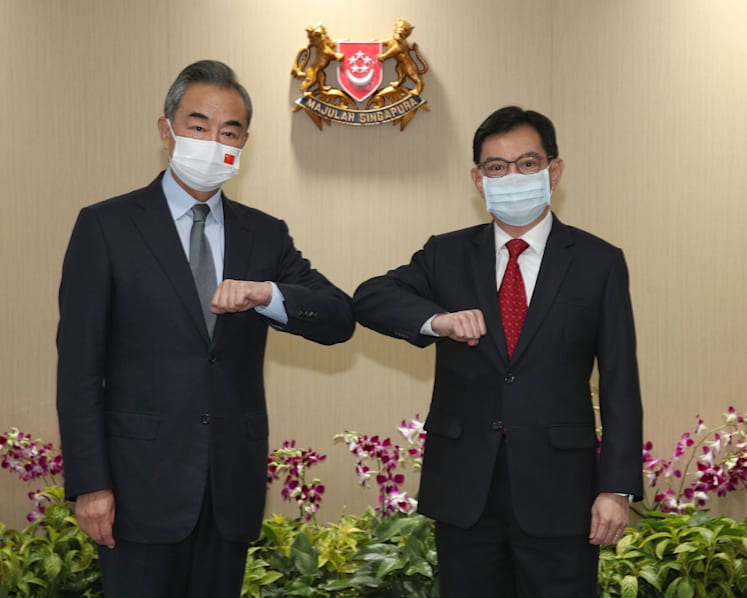 China's Foreign Minister Wang Yi meets Singapore DPM Heng, Minister Balakrishnan on first day of visit