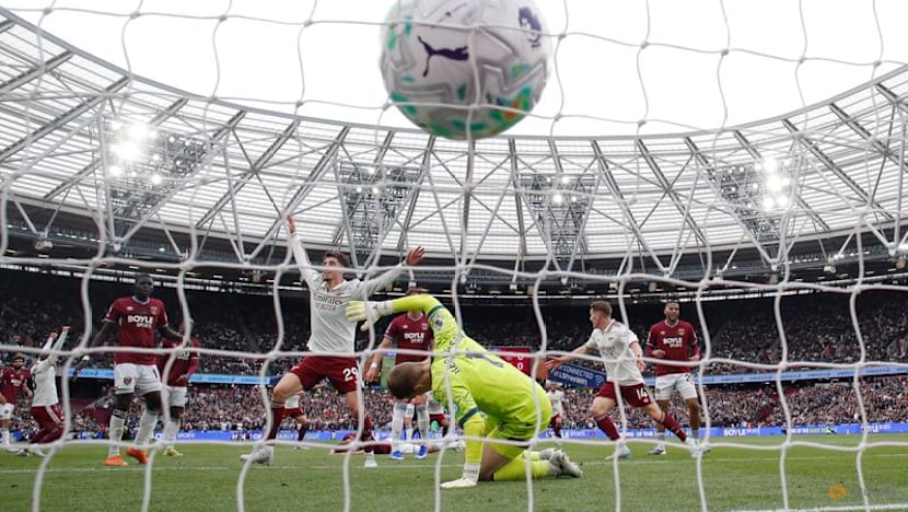 Arsenal survive huge scare to edge towards title