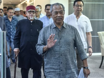 Perikatan Nasional chairman Muhyiddin Yassin arrives to attend a press conference at the party's headquarters in Kuala Lumpur, on Nov 24, 2022.
