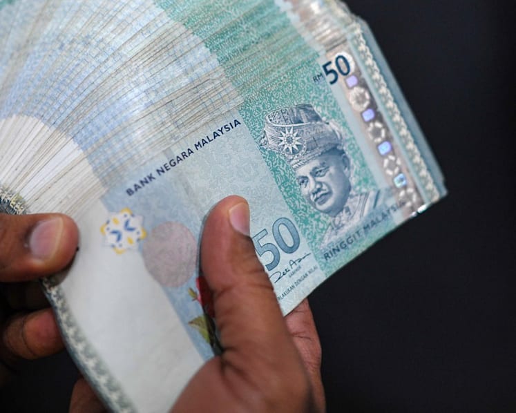 Adopt 'Malaysia First' attitude to strengthen ringgit, says country's finance ministry