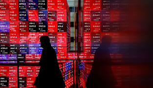 Asian markets sink, silver hits record as Greenland fears mount