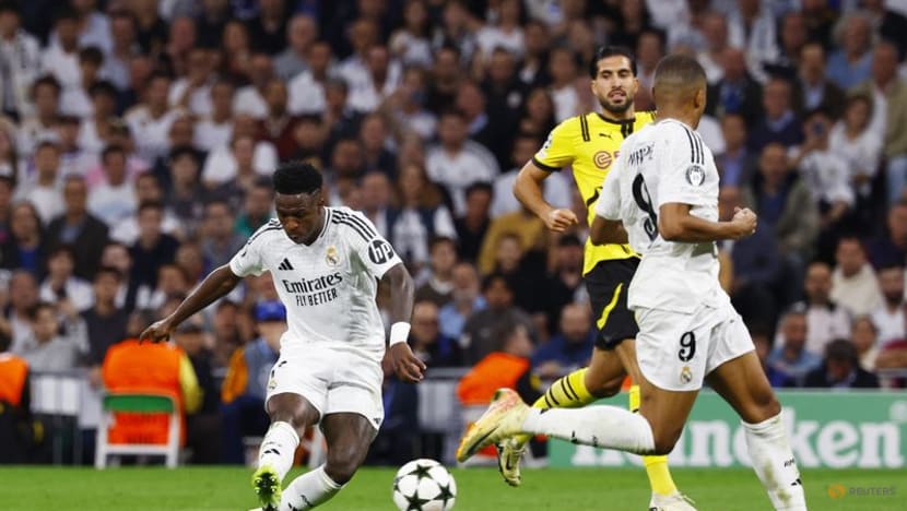 Real's Vinicius grabs hat-trick in 5-2 comeback win over Dortmund Real's Vinicius grabs hat-trick in 5-2 comeback win over Dortmund