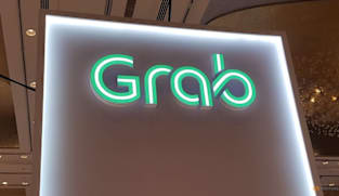 Grab beats quarterly revenue estimates on resilient consumer spending 