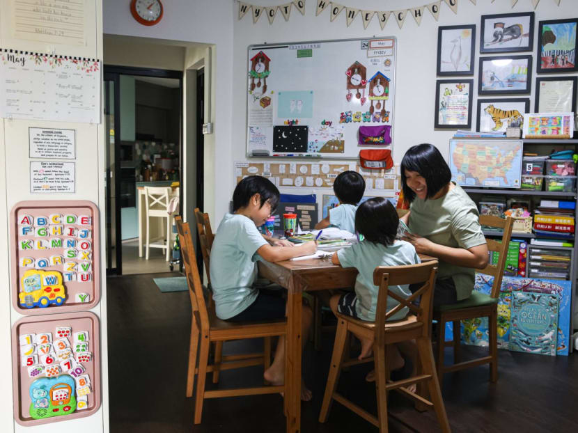 Mrs Gwyneth Nyoto teaching her sons at home in their study corner. Mrs Gwyneth Nyoto teaching her sons at home in their study corner.
