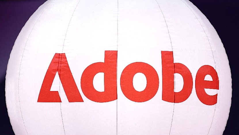 Adobe beats third-quarter revenue estimates