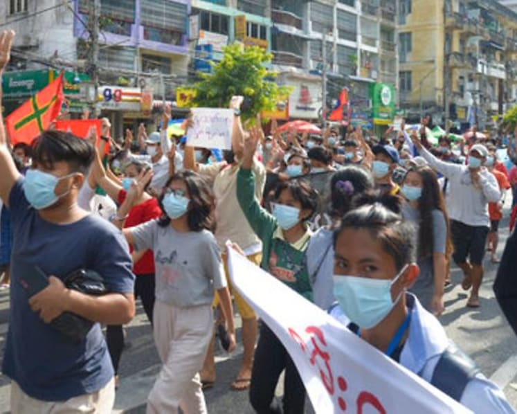 Flash mobs in Myanmar's biggest city avoid deadly response