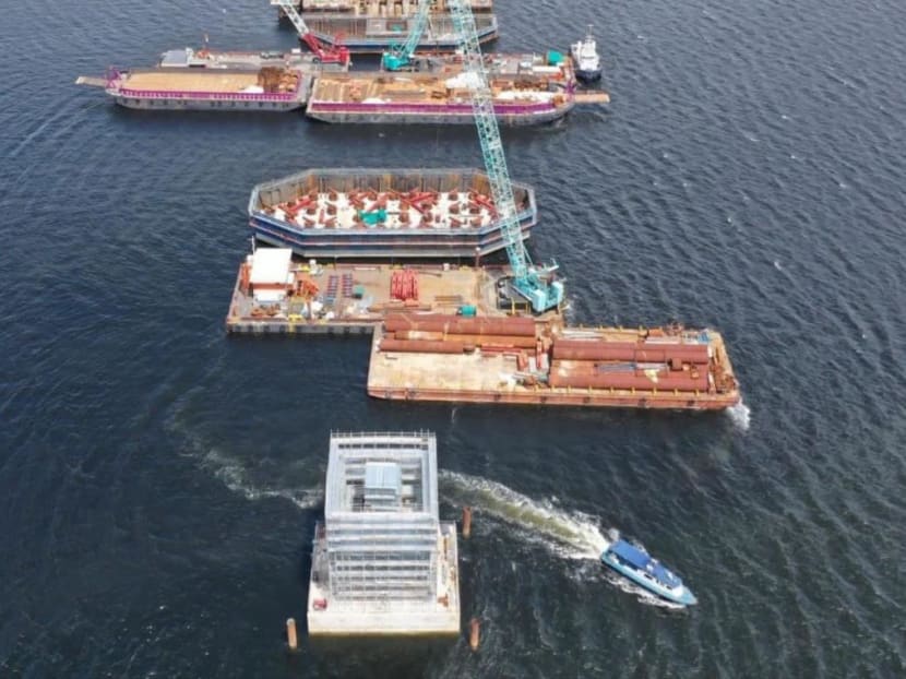Construction of pile caps in the Straits of Johor. 